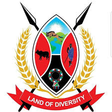 Narok County coat of arms with spears and 'Land of Diversity' banner